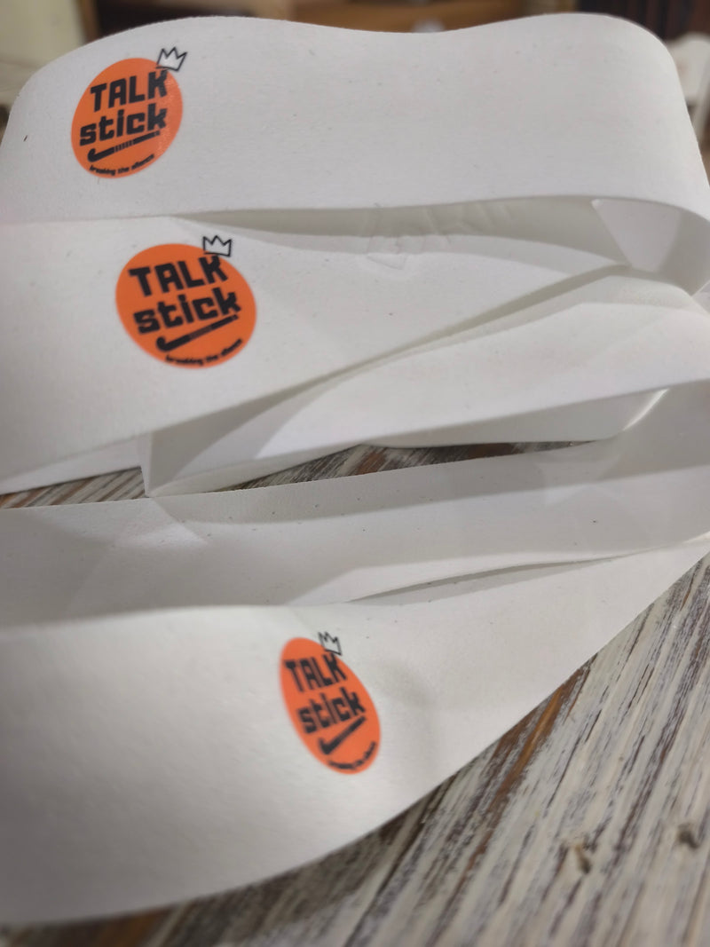 Talk Stick logo printed on a set of coloured Griptonyte grips
